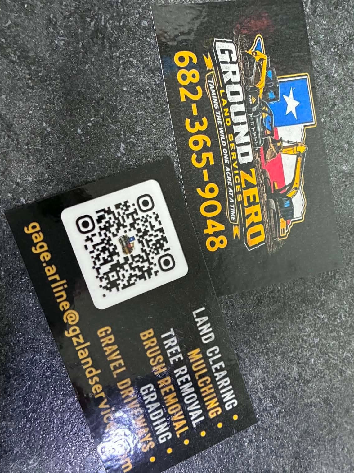 Custom laminated business cards sample showing Ground Zero Land Services design