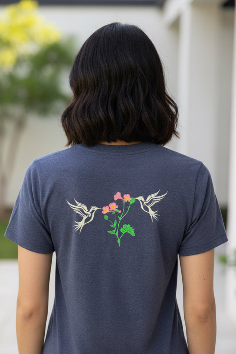 Hummingbird DTF print shirt back design with two hummingbirds and wildflowers on purple tee